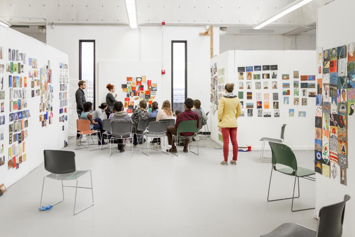 Students and professor in the studio